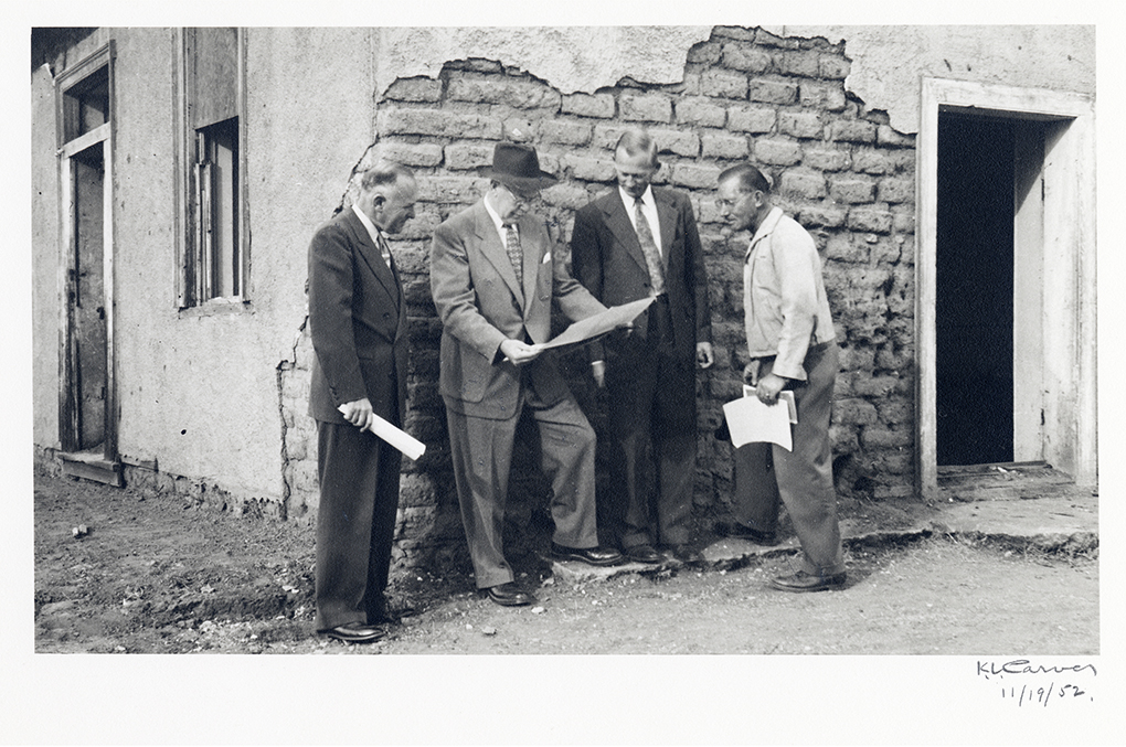 Image of K.L. Carver stand in front of the Adobe before the rehabilitation in 1952. Courtesy of San Marino Historical Society.